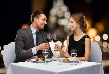 Image showing couple with non alcoholic wine at christmas