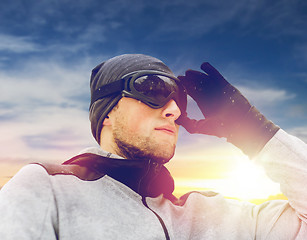 Image showing sports man with ski goggles in winter outdoors