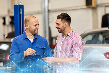 Image showing auto mechanic with clipboard and man at car shop