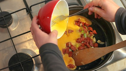 Image showing Making scrambled eggs