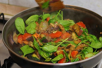 Image showing Preparing hot breakfast