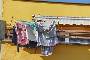 Image showing Clothes Hanging Outside