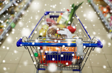 Image showing food in shopping cart or trolley at supermarket