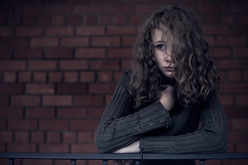 Image showing Portrait of a young sad girl.