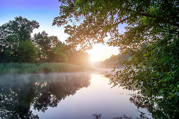 Image showing Morning fog on calm river