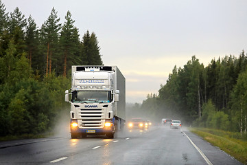 Image showing White Scania Trucking on Rainy Highway