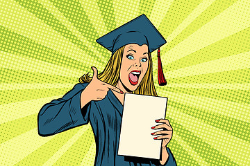 Image showing Female graduate points a finger at