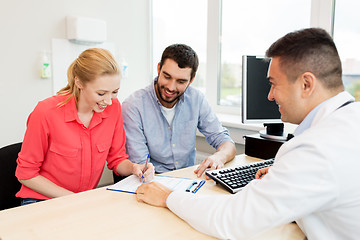 Image showing couple visiting doctor at family planning clinic