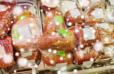 Image showing ham at grocery store stall