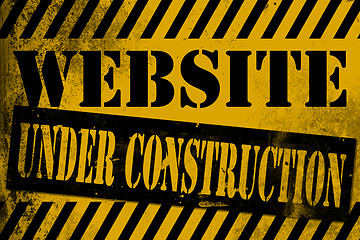 Image showing Website under construction sign yellow with stripes