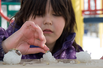 Image showing Girl Playing With Snow