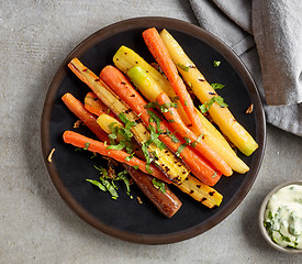 Image showing plate of grilled colorful carrots