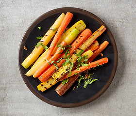 Image showing plate of grilled colorful carrots