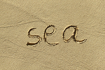 Image showing Natural sand background with scrawled word ''Sea''