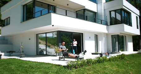 Image showing Rowing Machine on terrace of beautiful villa