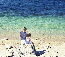 Image showing Happy family resting at beach in summer