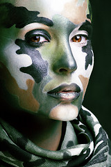 Image showing Beautiful young fashion woman with military style clothing and face paint make-up, khaki colors, halloween celebration