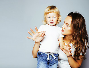 Image showing pretty real fashion mother with cute blond little daughter