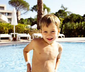 Image showing little cute boy in swimming pool