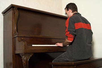 Image showing Male Playing Piano