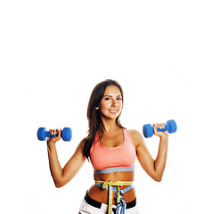 Image showing young pretty slim woman with dumbbell isolated