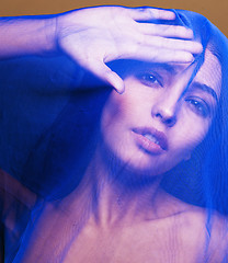 Image showing beauty young islamic woman under veil, blue hijab on face close up