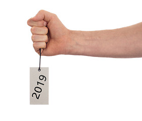 Image showing Hand holding a tag - New year - 2019