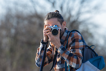 Image showing Photographer shoots close-up