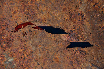 Image showing Map and flag of Cuba on rusty metal