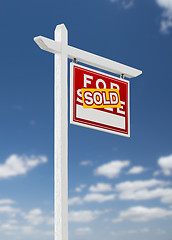 Image showing Right Facing Sold For Sale Real Estate Sign on a Blue Sky with C