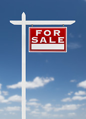 Image showing Right Facing For Sale Real Estate Sign on a Blue Sky with Clouds