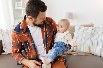 Image showing happy father with little baby boy at home