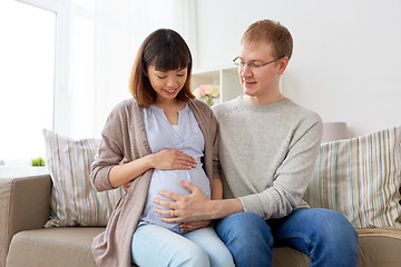 Image showing happy pregnant wife with husband at home