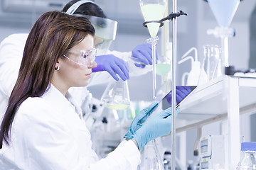 Image showing Chemists researching in life science laboratory.