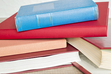 Image showing stack of books on the floor