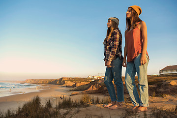 Image showing Girls looking the ocean