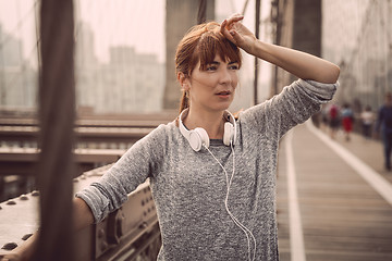 Image showing Woman resting after exercise