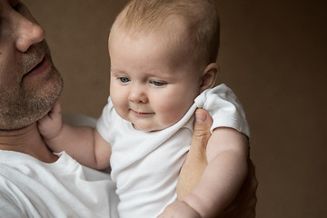 Image showing Father Holding Newborn Baby Son