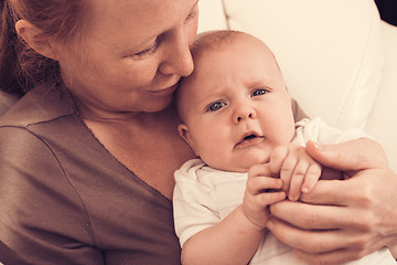 Image showing Mother holding sweet baby boy