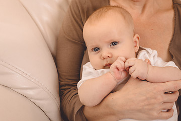 Image showing Mother holding sweet baby boy