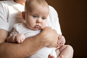 Image showing Father Holding Newborn Baby Son