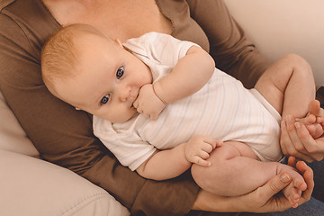 Image showing Mother holding sweet baby boy