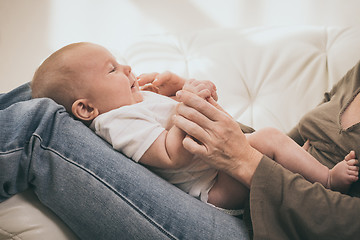 Image showing Mother holding sweet baby boy