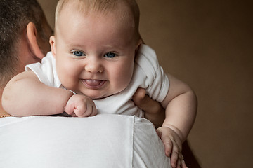 Image showing Father Holding Newborn Baby Son