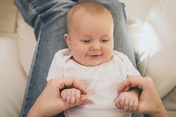 Image showing Mother holding sweet baby boy