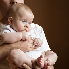 Image showing Father Holding Newborn Baby Son