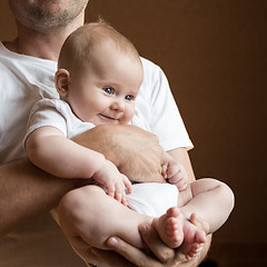 Image showing Father Holding Newborn Baby Son