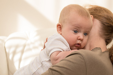 Image showing Mother holding sweet baby boy