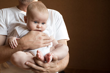 Image showing Father Holding Newborn Baby Son