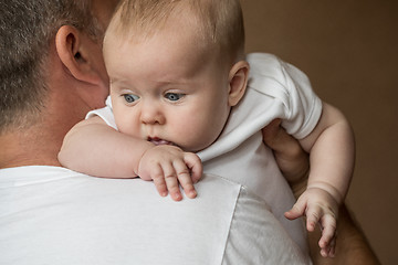 Image showing Father Holding Newborn Baby Son